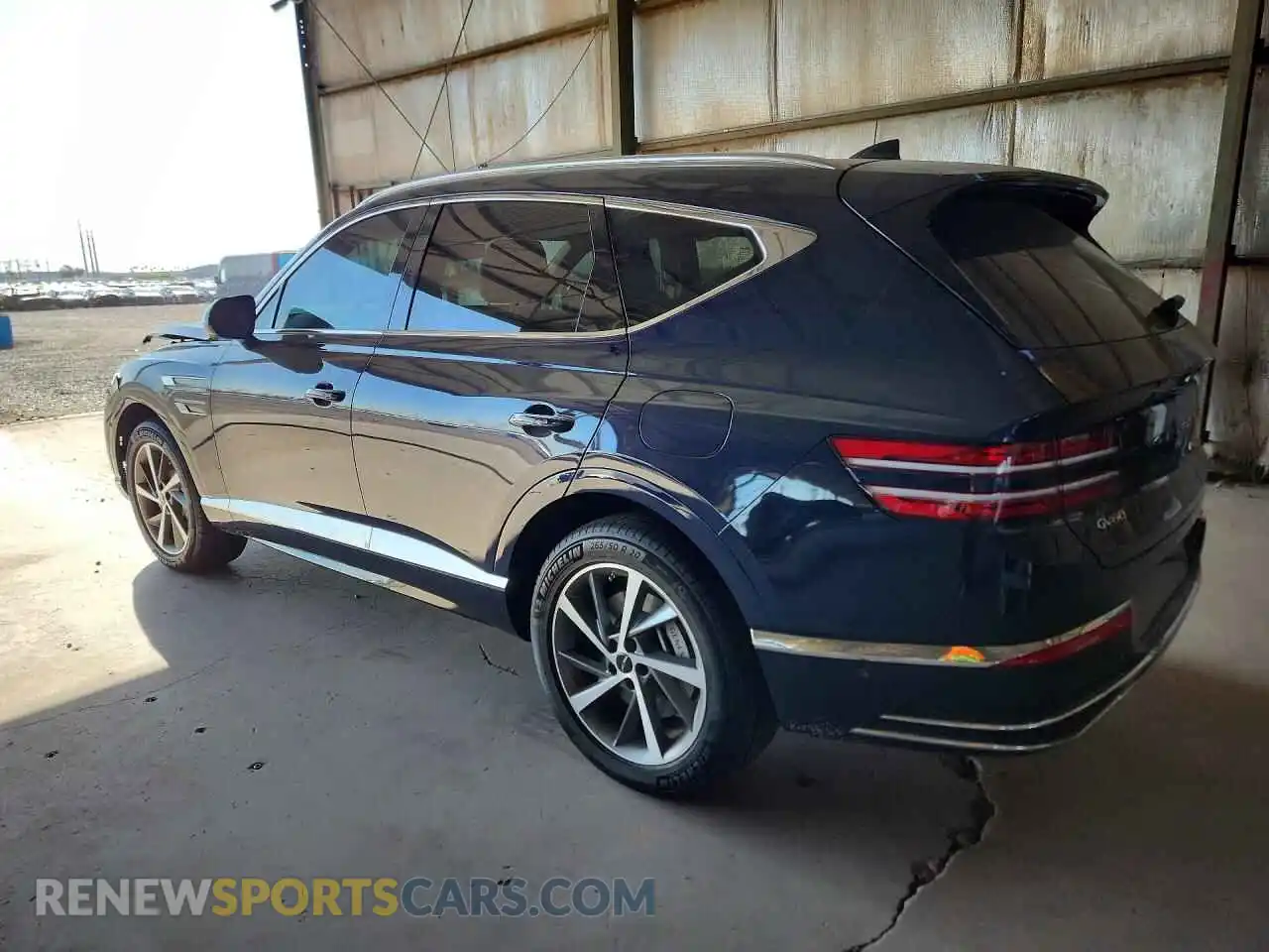 2 fotografías del automóvil dañado KMUHBESB6TU352017 GENESIS GV80 2026
