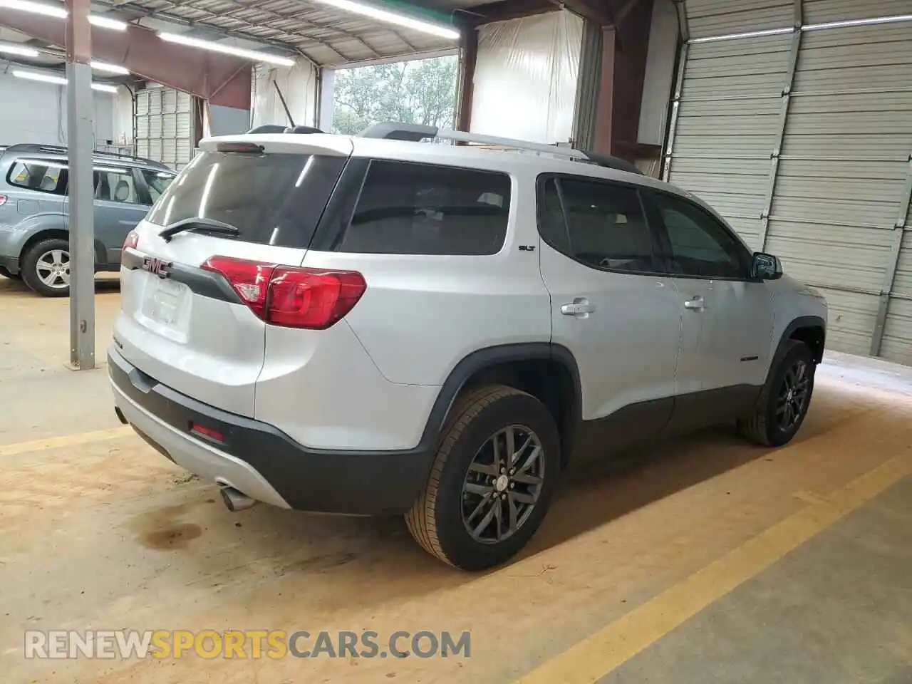 3 Photograph of a damaged car 1GKKNMLS0KZ140809 GMC ACADIA 2019