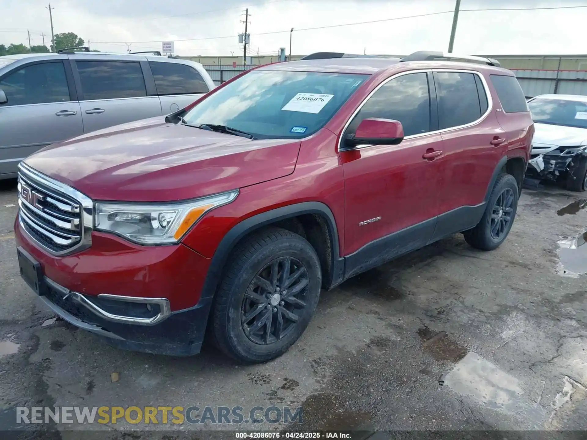 2 Photograph of a damaged car 1GKKNMLS3KZ130971 GMC ACADIA 2019