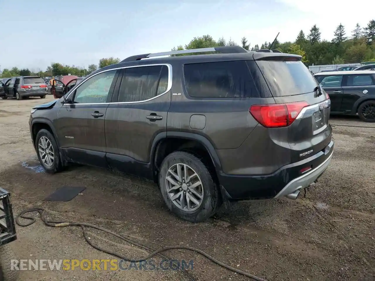 2 Photograph of a damaged car 1GKKNSLS4KZ156497 GMC ACADIA 2019