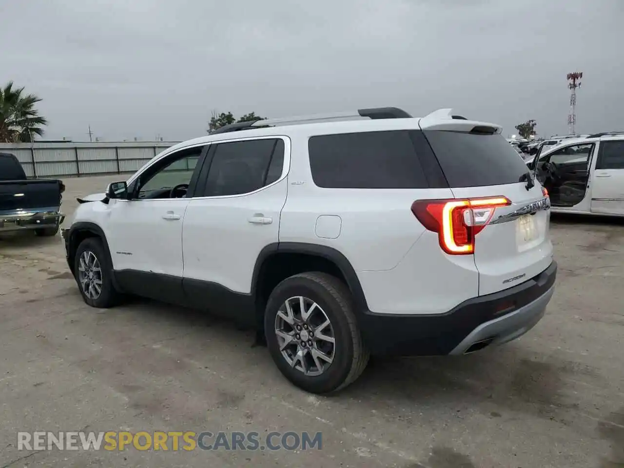 2 Photograph of a damaged car 1GKKNULS9MZ219995 GMC ACADIA 2021