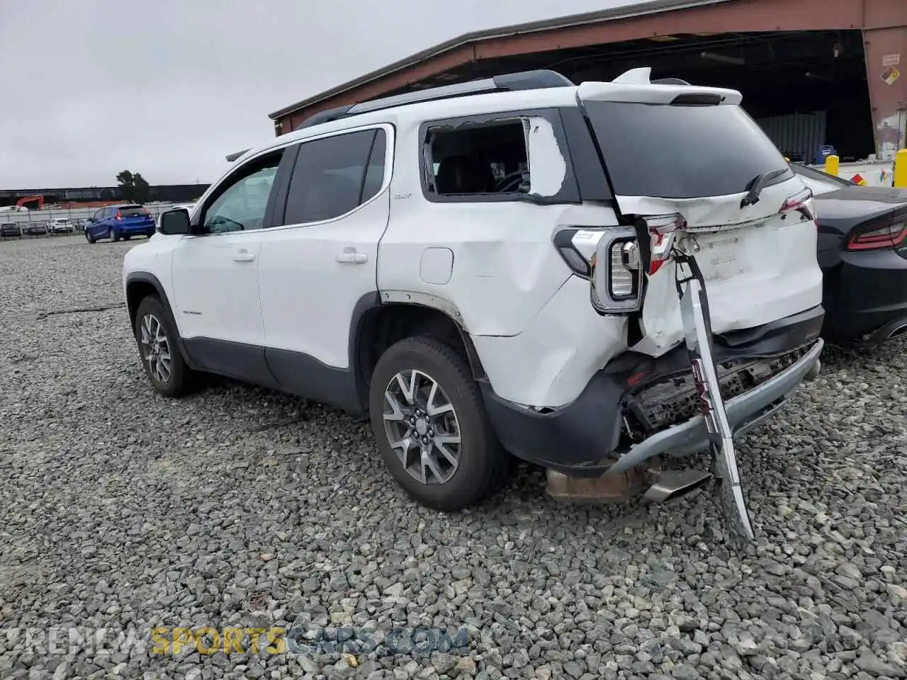 2 Photograph of a damaged car 1GKKNML49PZ146911 GMC ACADIA 2023