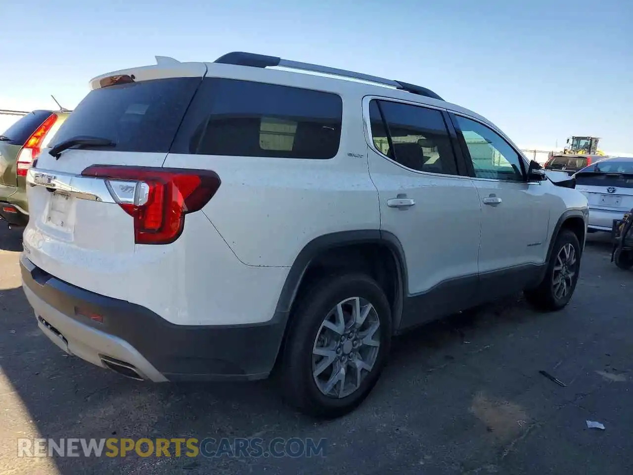 3 Фотография поврежденного автомобиля 1GKKNML49PZ169816 GMC ACADIA 2023