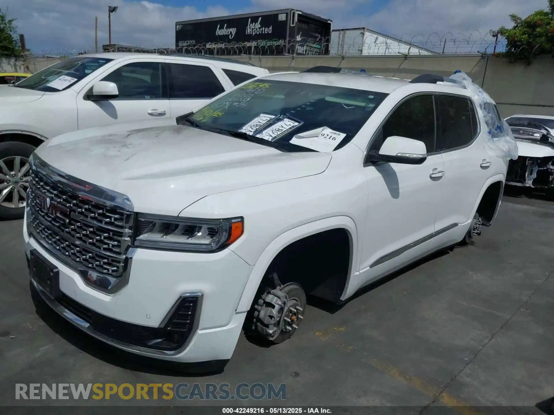 2 Photograph of a damaged car 1GKKNPL4XPZ226865 GMC ACADIA 2023