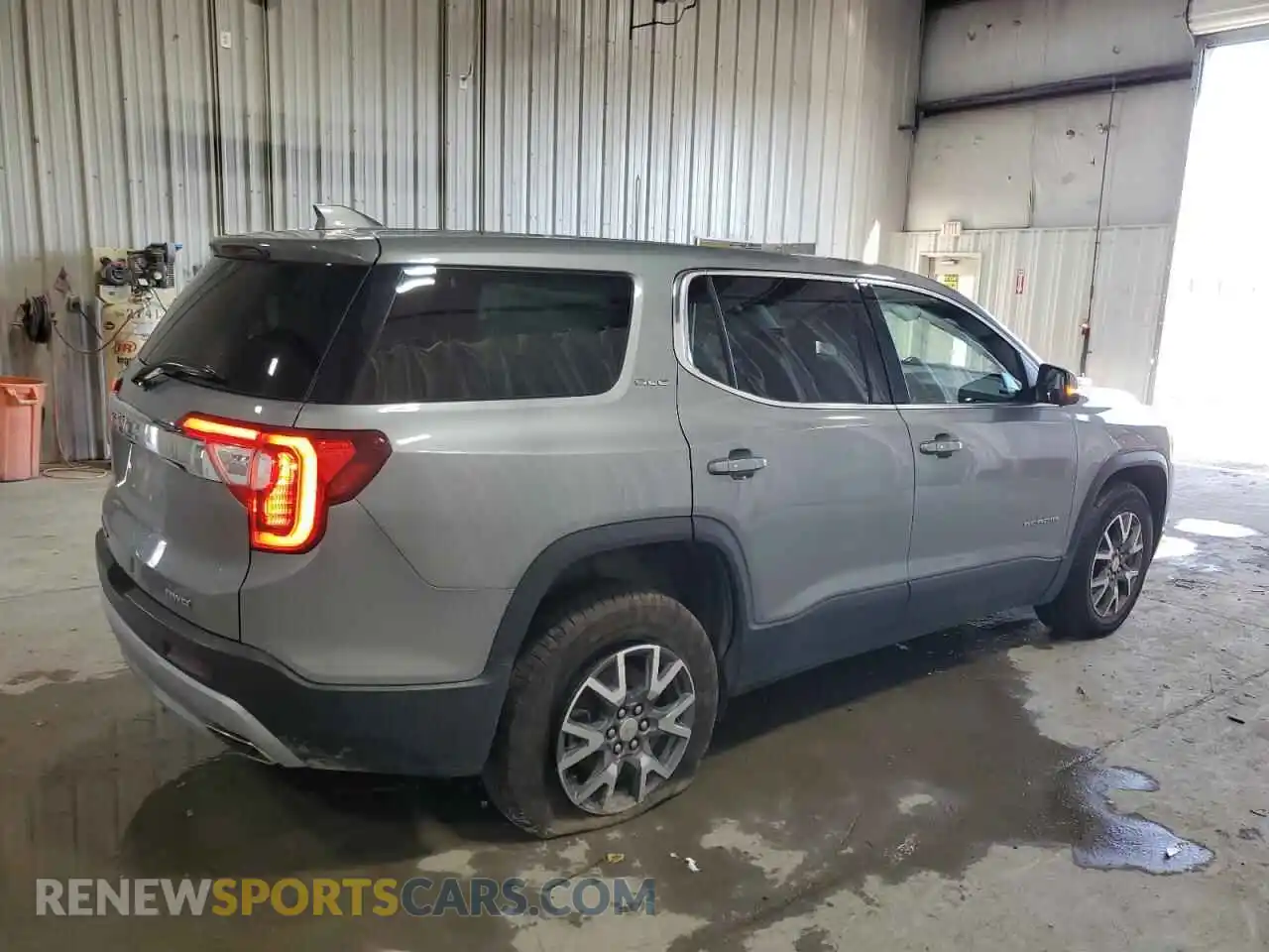 3 Photograph of a damaged car 1GKKNRL41PZ110336 GMC ACADIA 2023