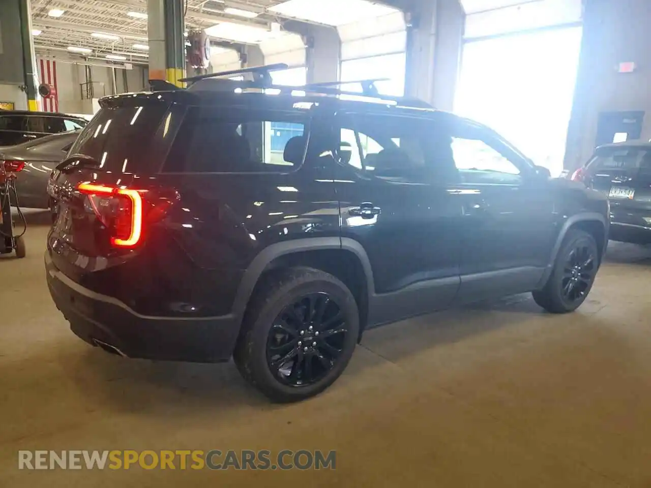 3 Photograph of a damaged car 1GKKNRLS8PZ145020 GMC ACADIA 2023