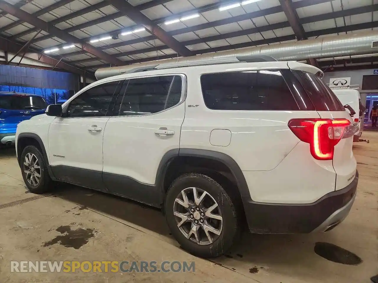 2 Photograph of a damaged car 1GKKNUL41PZ150581 GMC ACADIA 2023