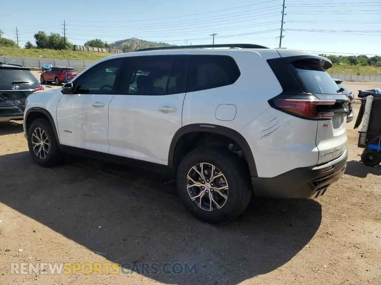 2 Photograph of a damaged car 1GKENPKSXRJ200006 GMC ACADIA 2024