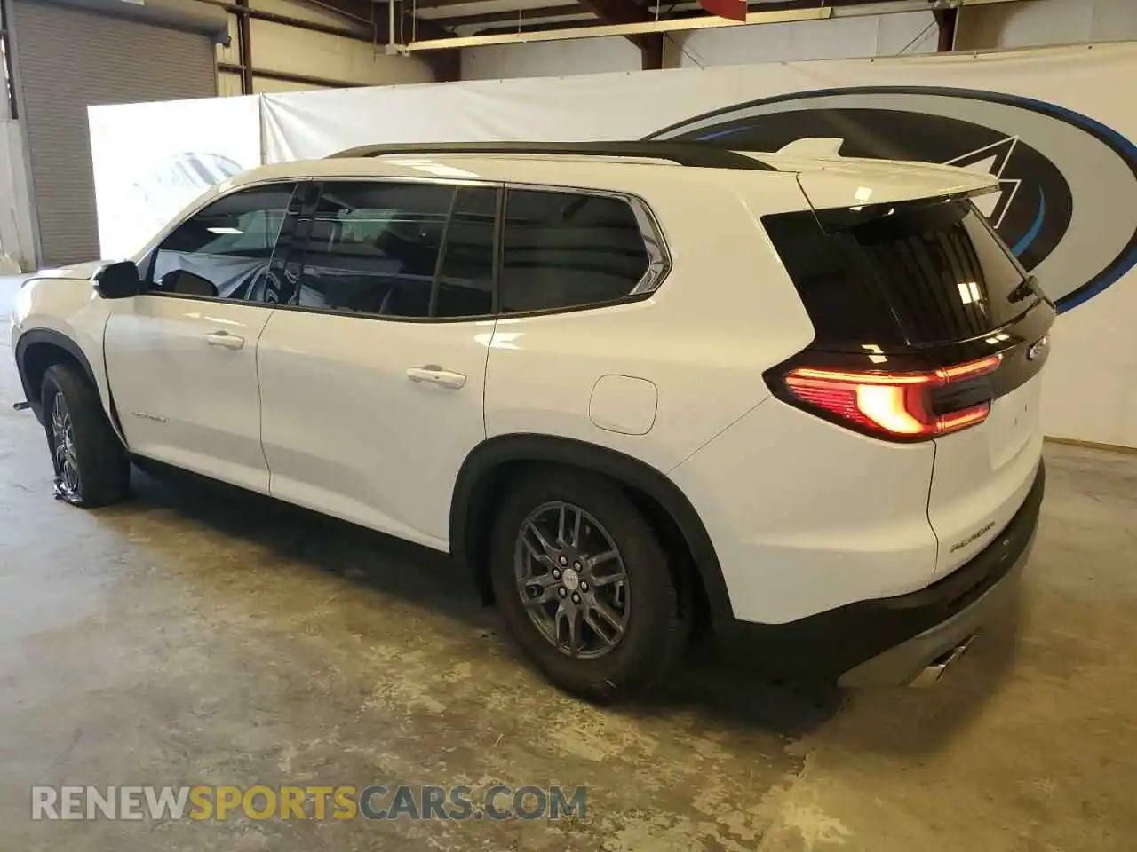 2 Photograph of a damaged car 1GKENKRSXSJ146897 GMC ACADIA ELE 2025