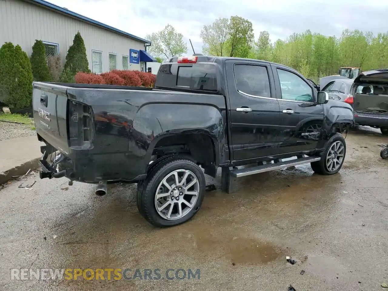 3 Photograph of a damaged car 1GTG6EEN3M1132541 GMC CANYON 2021