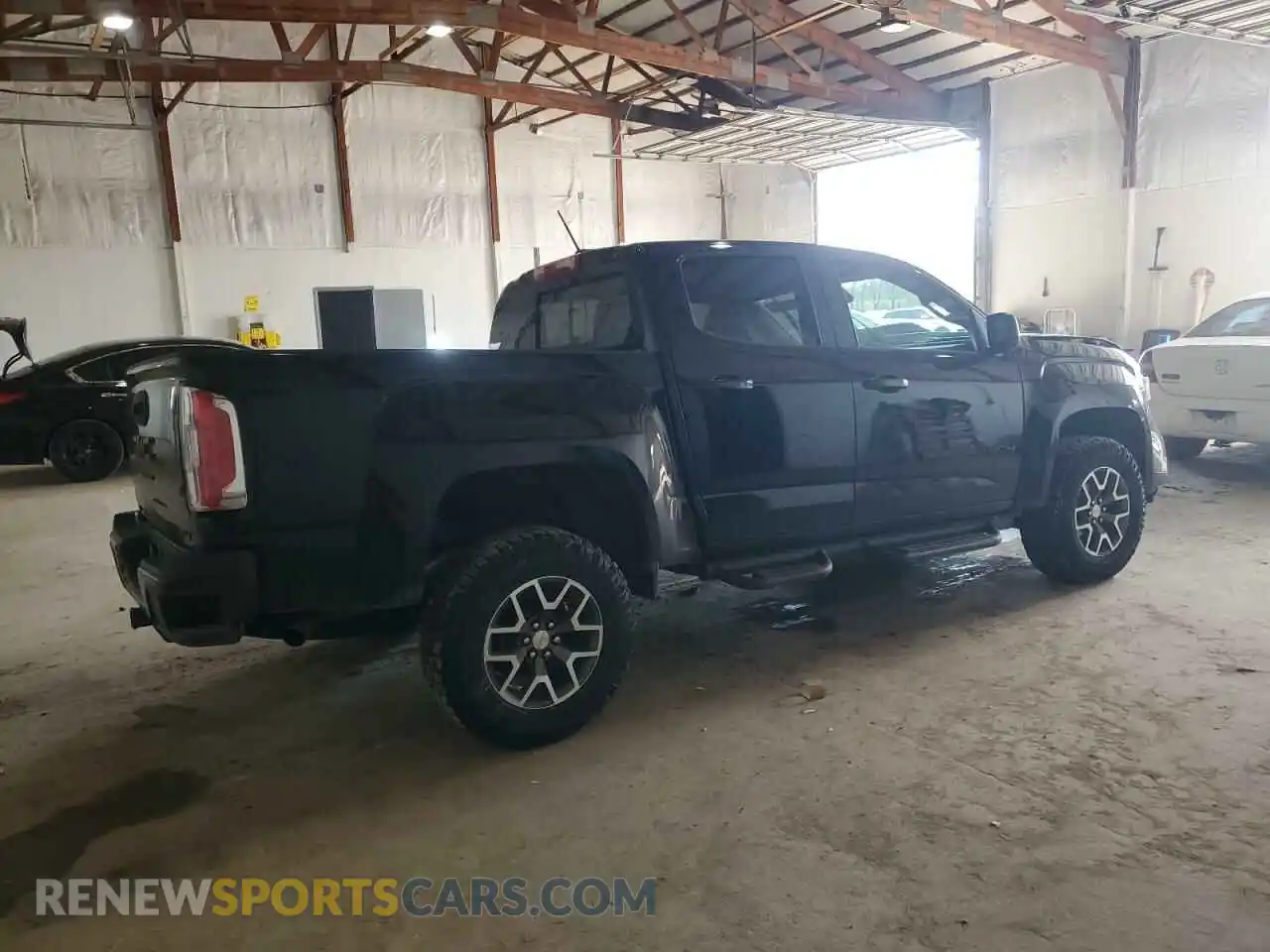 3 Photograph of a damaged car 1GTG6FEN9M1118648 GMC CANYON 2021