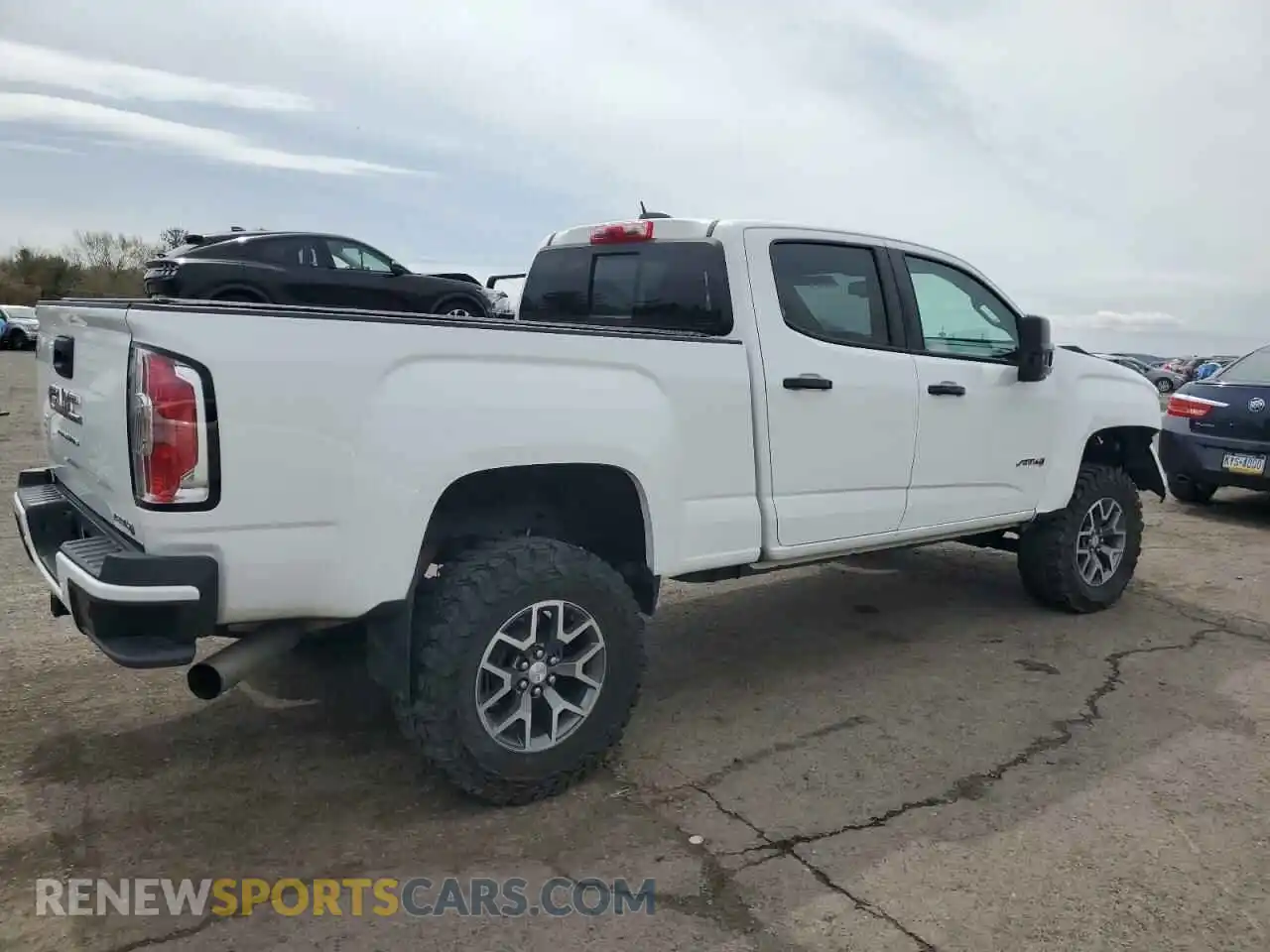 3 Photograph of a damaged car 1GTP6FE14M1190774 GMC CANYON 2021