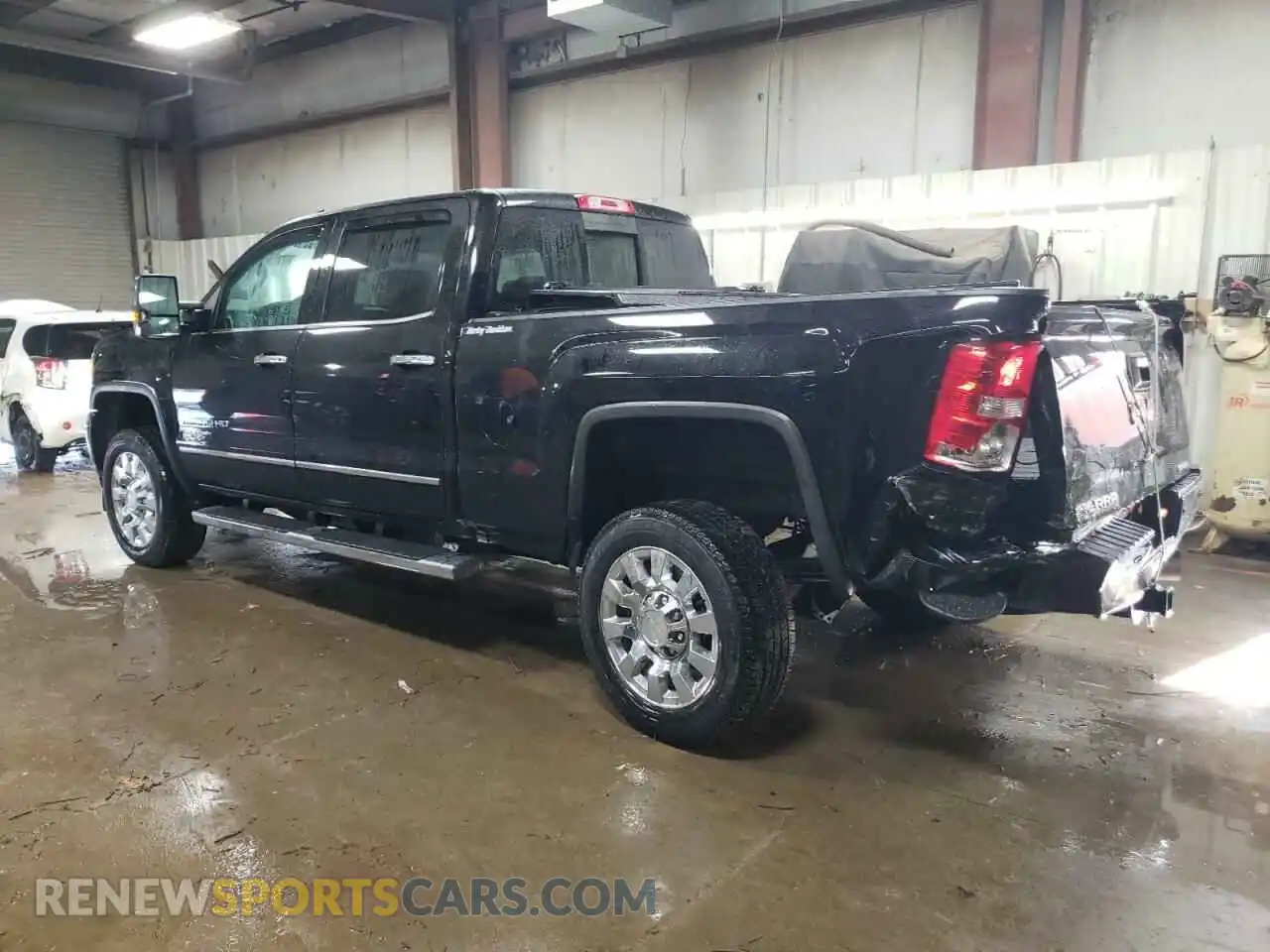 2 Photograph of a damaged car 1GT12SEY2KF219941 GMC SIERRA 2019