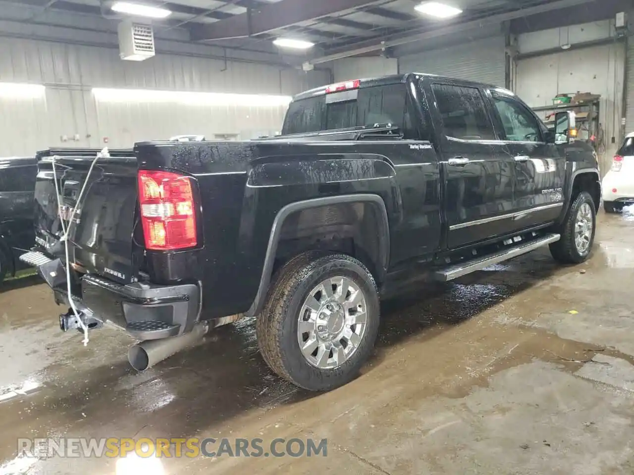 3 Photograph of a damaged car 1GT12SEY2KF219941 GMC SIERRA 2019