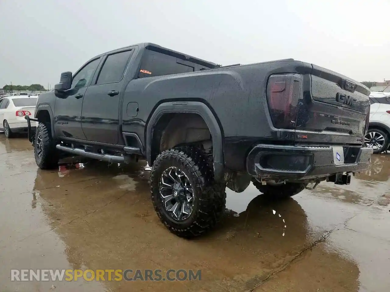 2 Photograph of a damaged car 1GT49PEY3LF205196 GMC SIERRA 2020