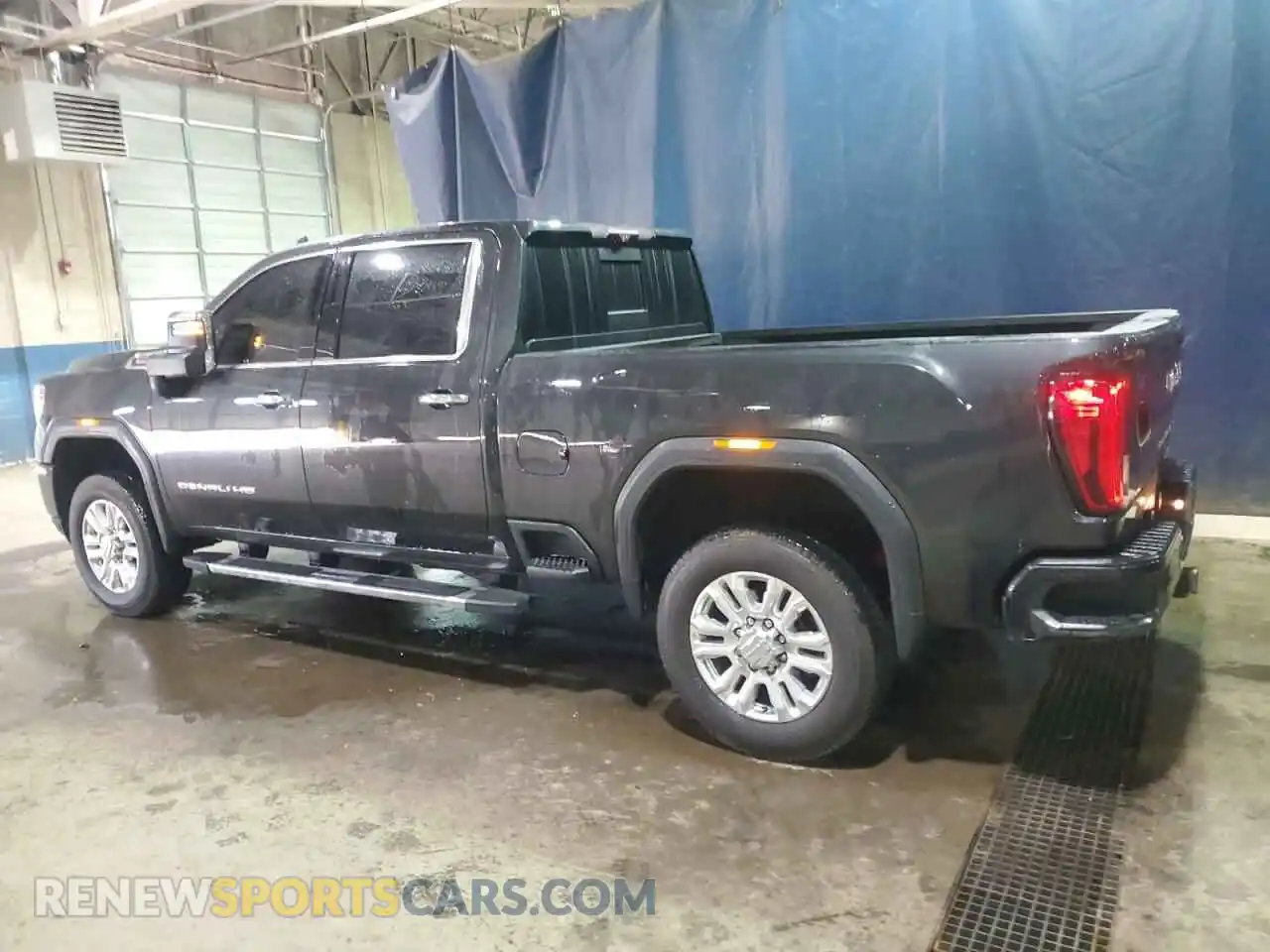 2 Photograph of a damaged car 1GT49REY6LF321679 GMC SIERRA 2020