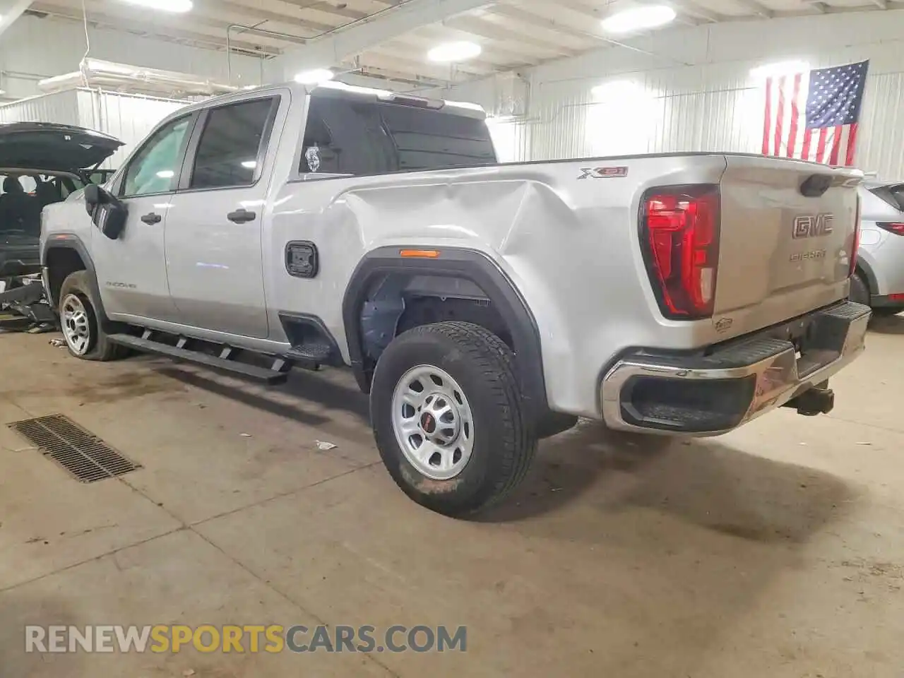2 Photograph of a damaged car 1GT49LEY4MF104517 GMC SIERRA 2021