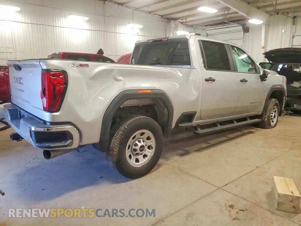 3 Photograph of a damaged car 1GT49LEY4MF104517 GMC SIERRA 2021