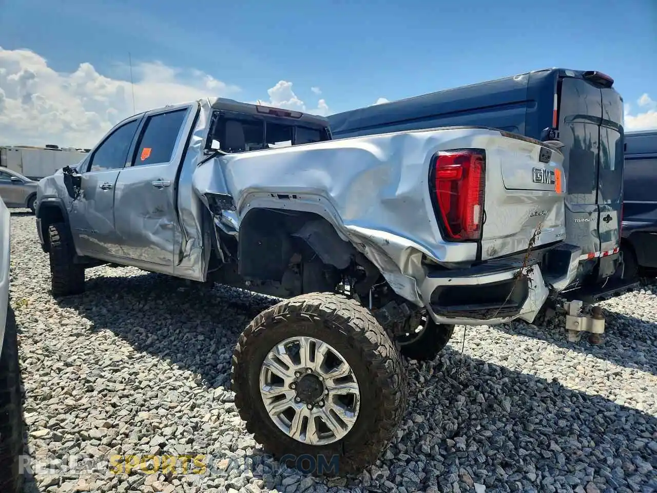 2 fotografías del automóvil dañado 1GT49REY0MF171098 GMC SIERRA 2021