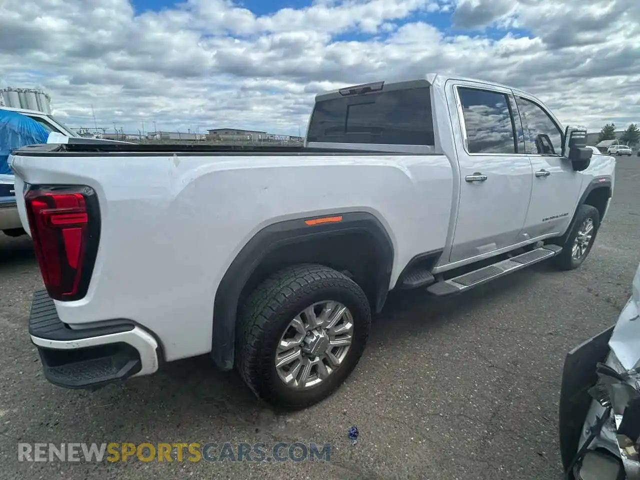 3 Photograph of a damaged car 1GT49REY0MF295873 GMC SIERRA 2021