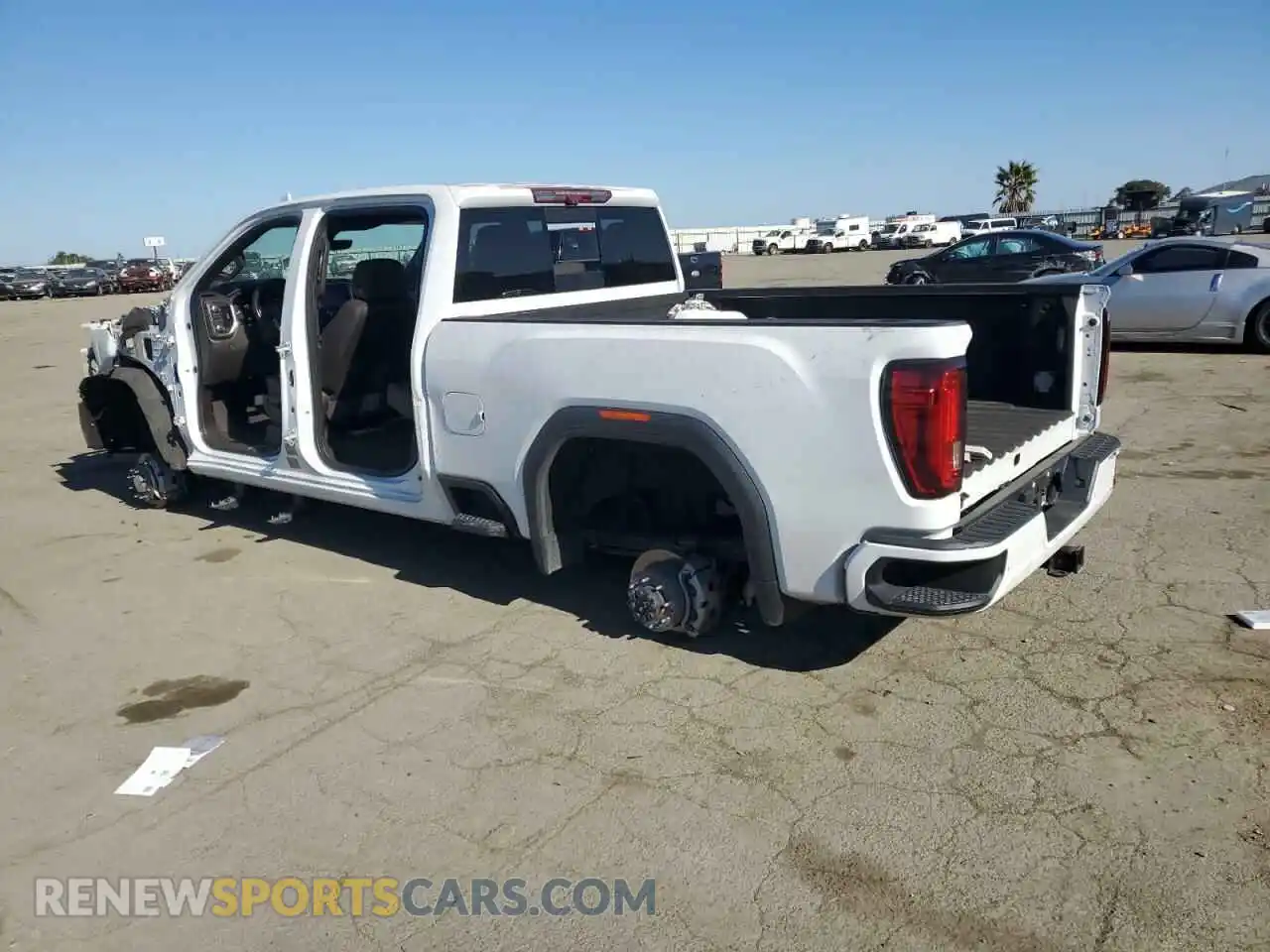 2 Photograph of a damaged car 1GT49REY4MF100597 GMC SIERRA 2021