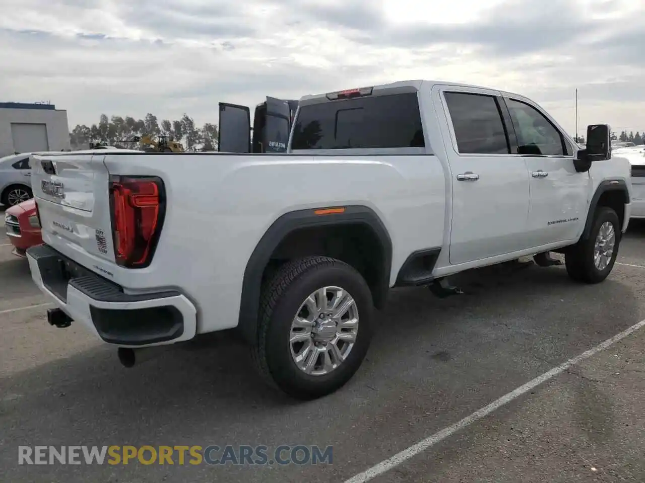 3 Photograph of a damaged car 1GT49REY7MF310532 GMC SIERRA 2021