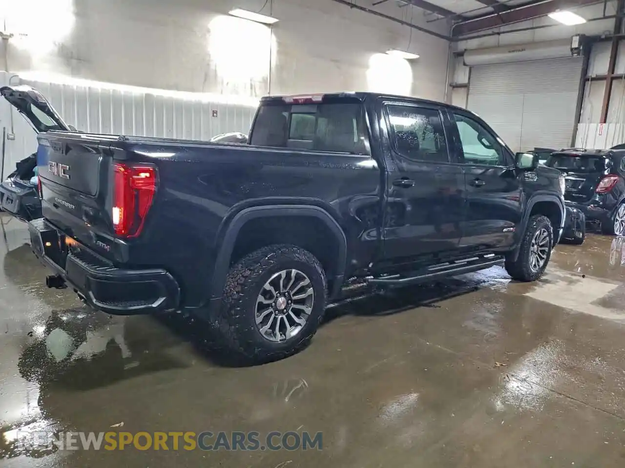3 Photograph of a damaged car 3GTP9EED2MG243663 GMC SIERRA 2021