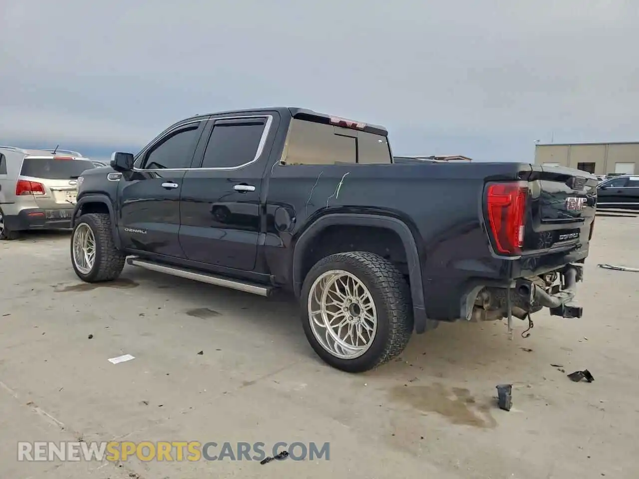 2 Photograph of a damaged car 3GTU9FEL5MG340405 GMC SIERRA 2021