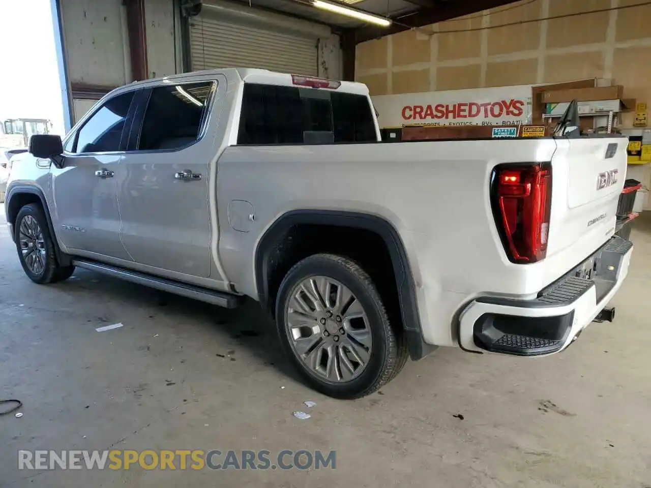 2 Photograph of a damaged car 3GTU9FELXMG324670 GMC SIERRA 2021