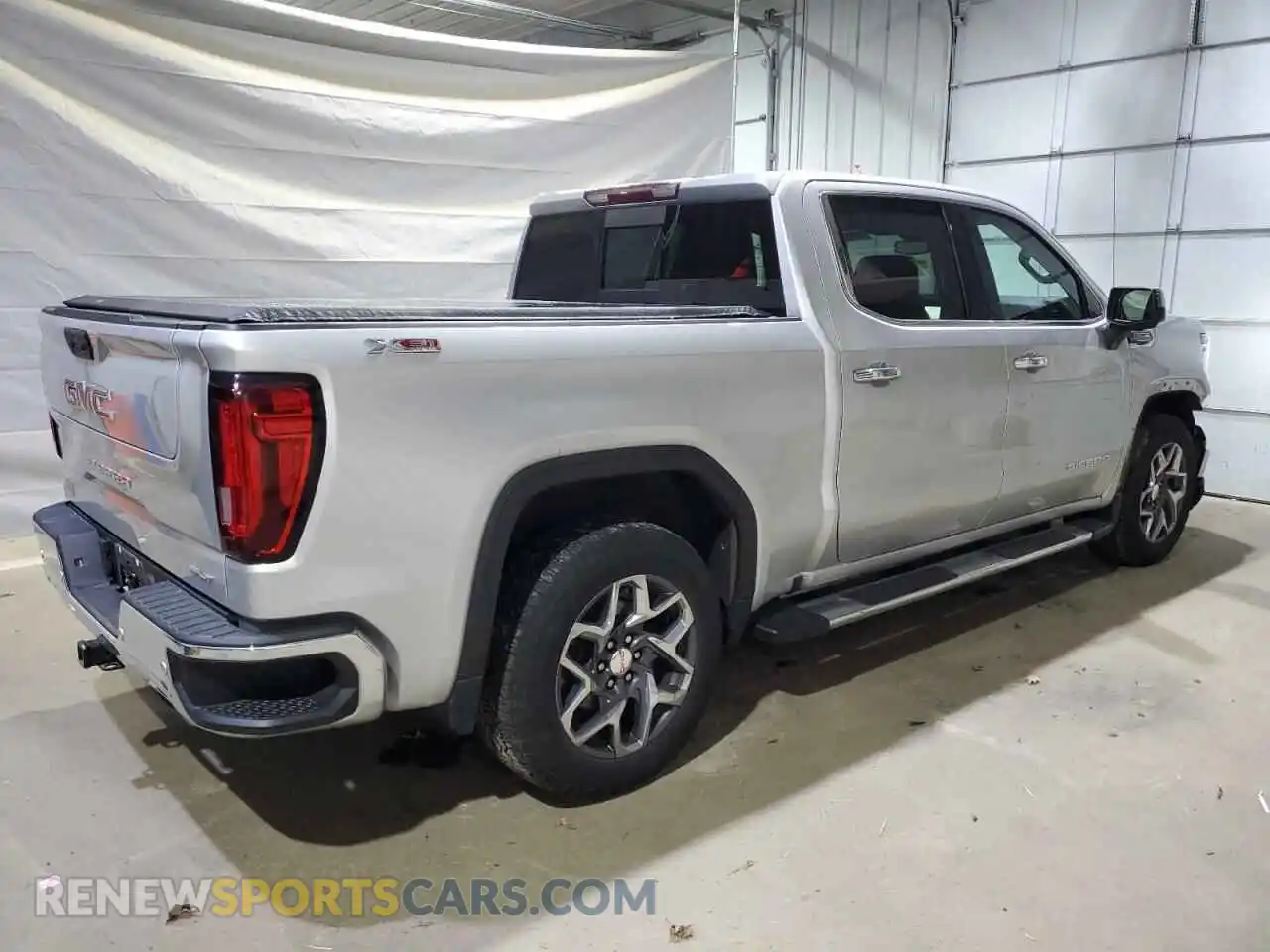 3 Photograph of a damaged car 1GTUUDEL8NZ573196 GMC SIERRA 2022