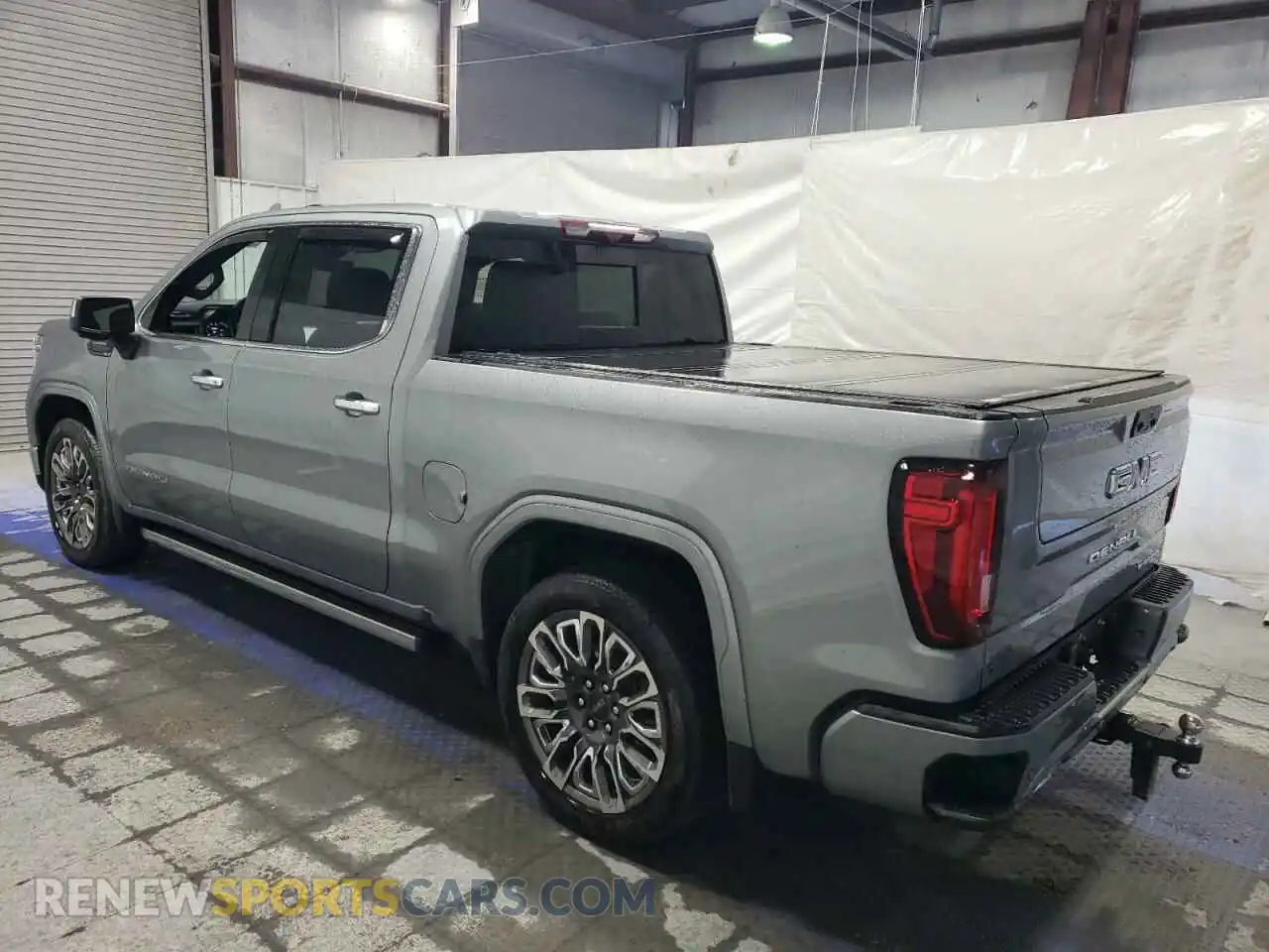 2 Photograph of a damaged car 1GTUUHE81PZ308237 GMC SIERRA 2023