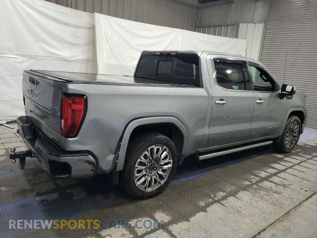 3 Photograph of a damaged car 1GTUUHE81PZ308237 GMC SIERRA 2023