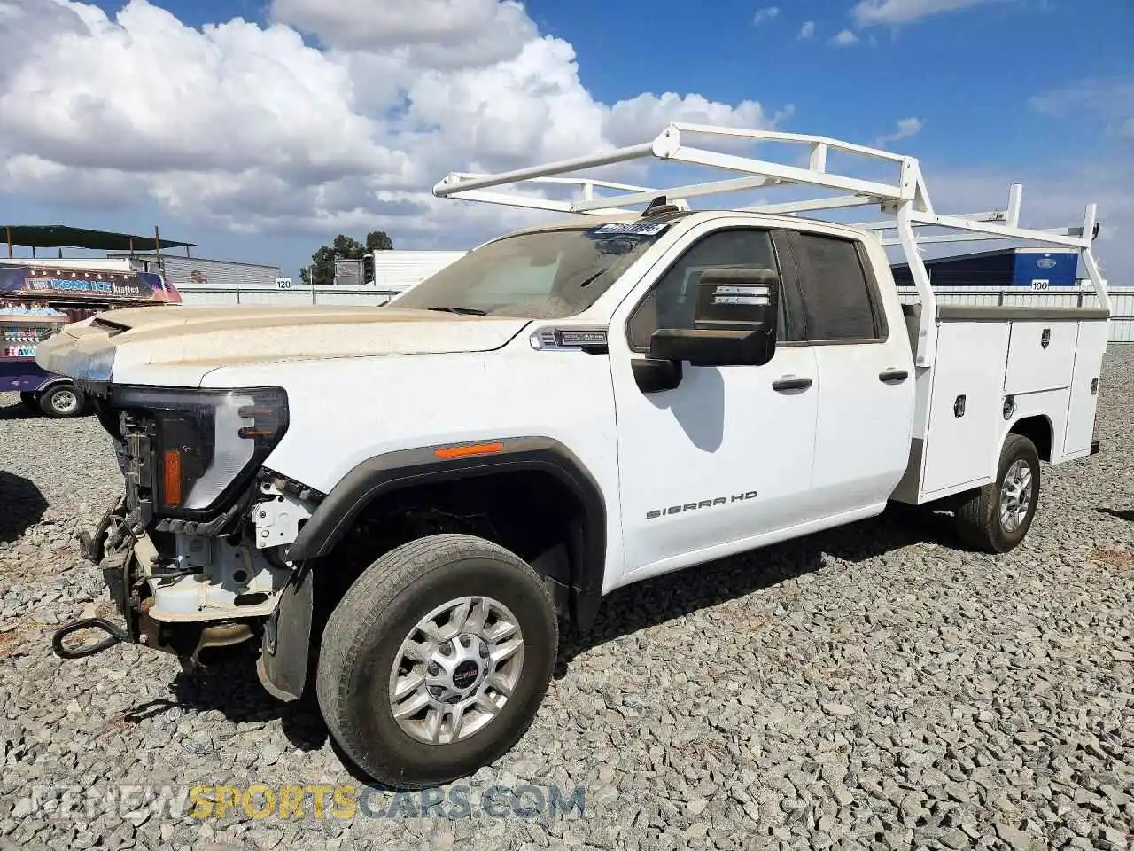 1 Photograph of a damaged car 1GD58LE73RF119057 GMC SIERRA 2024