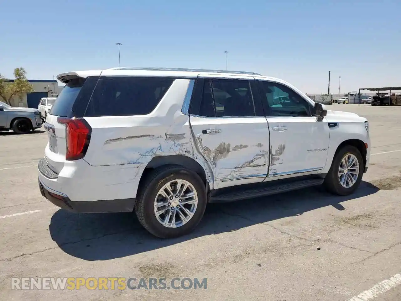 3 Photograph of a damaged car 1GKS1BKD1MR250029 GMC YUKON 2021