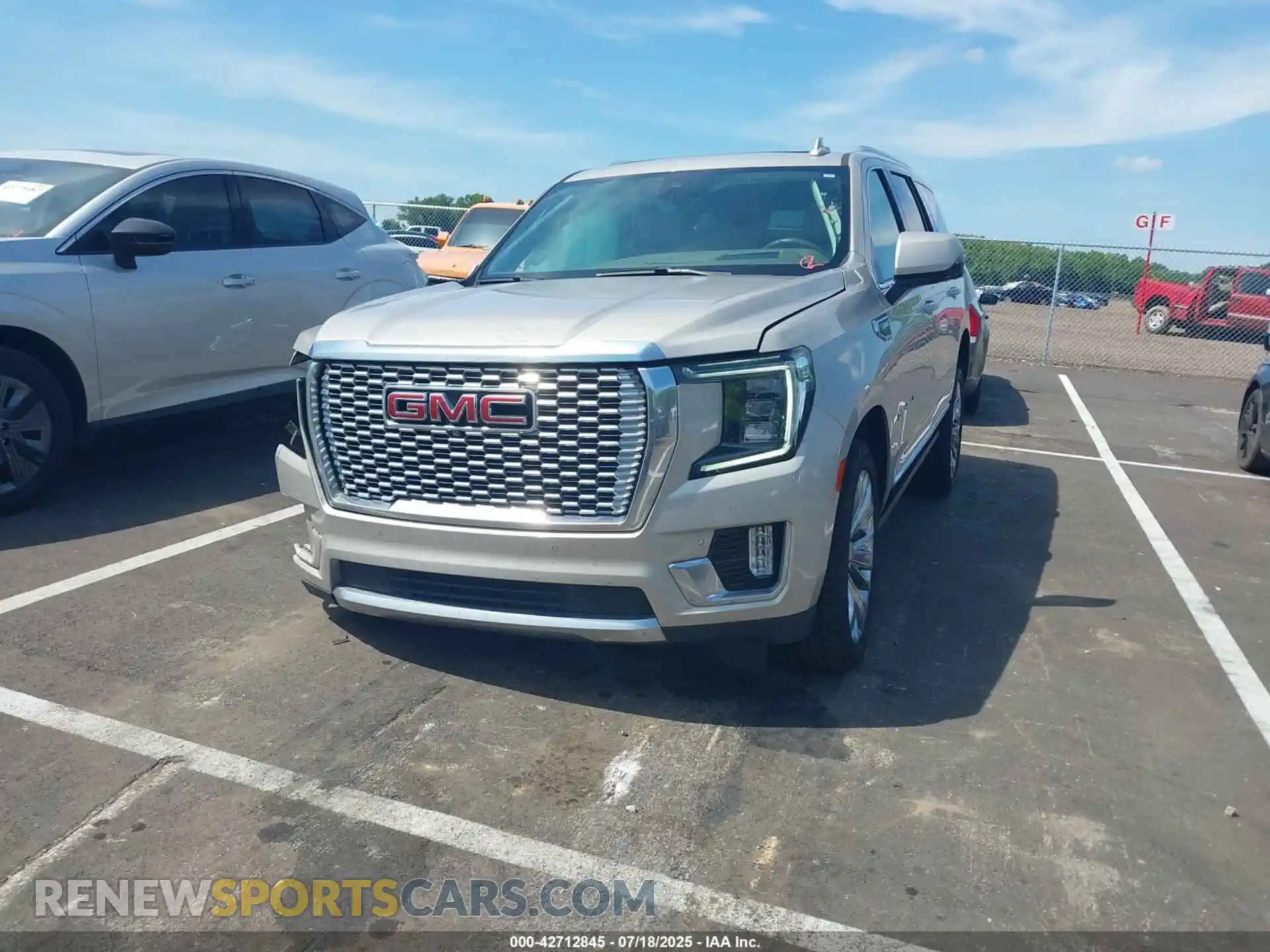 2 Photograph of a damaged car 1GKS2DKL7MR130896 GMC YUKON 2021