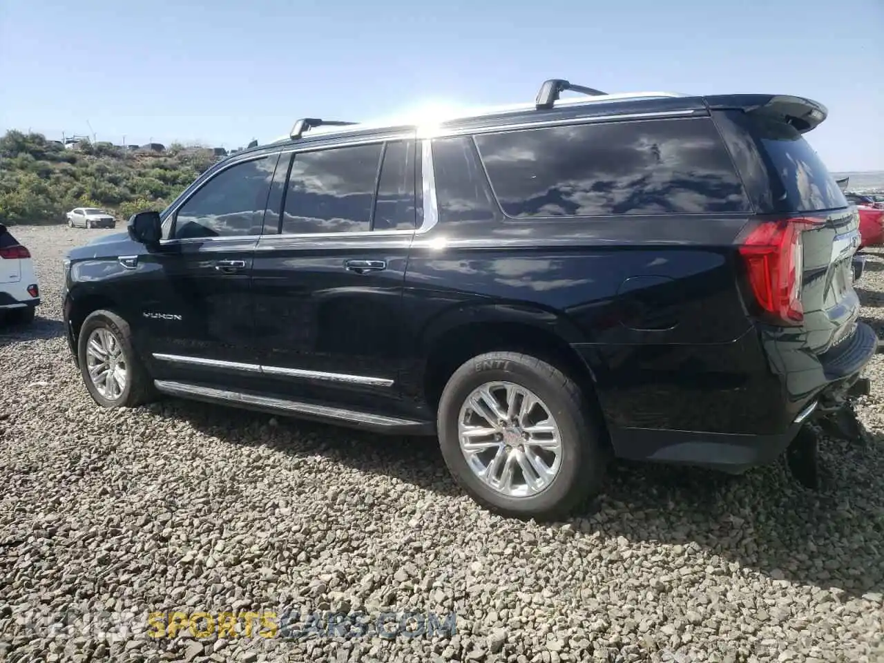 2 Photograph of a damaged car 1GKS2GKD1MR370472 GMC YUKON 2021