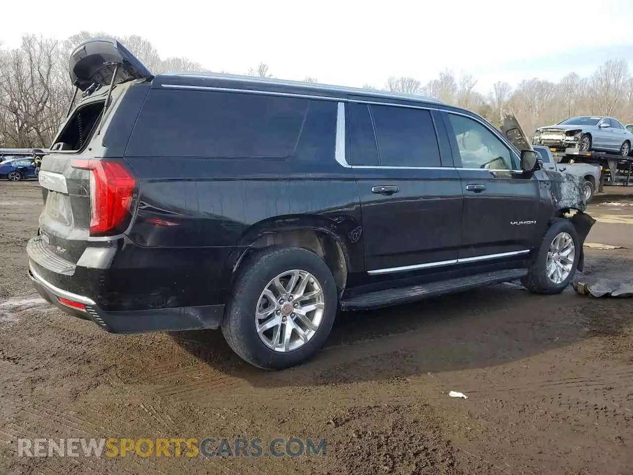 3 Photograph of a damaged car 1GKS2GKDXNR310823 GMC YUKON 2022