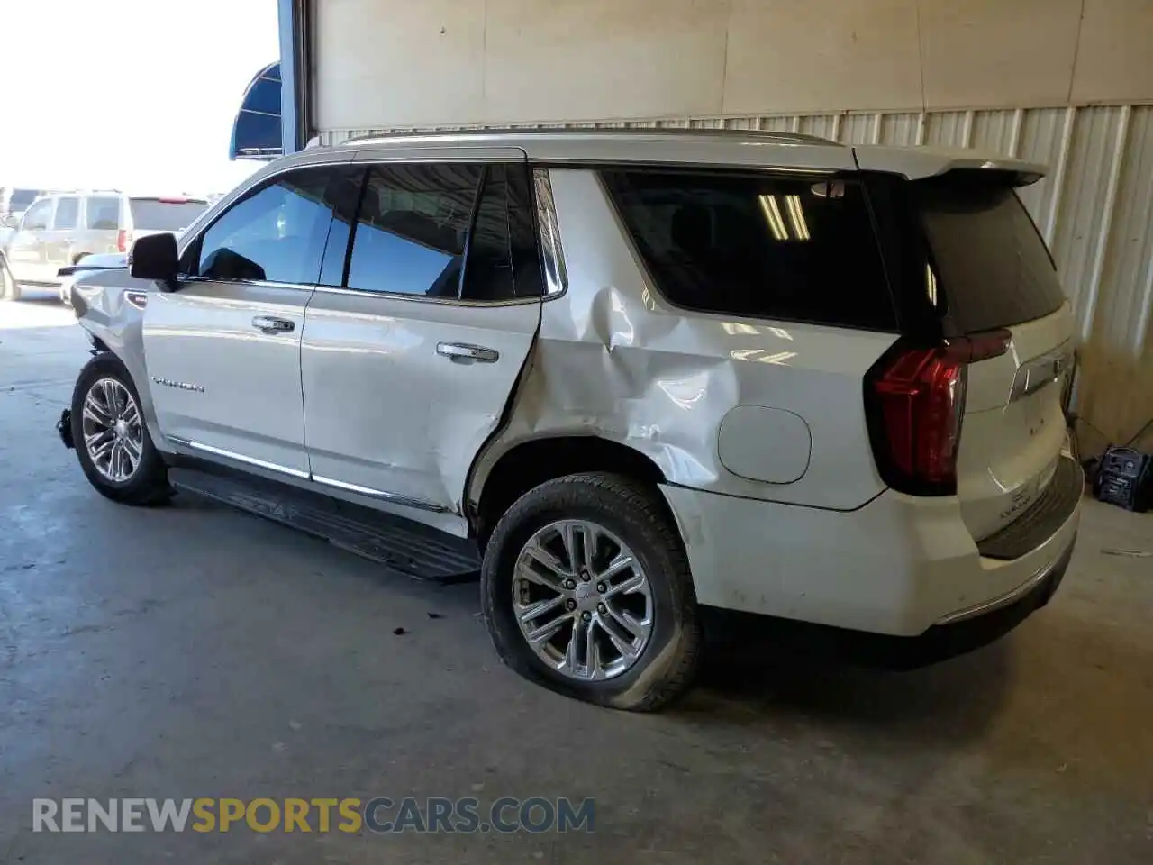 2 Photograph of a damaged car 1GKS2BKT0PR401984 GMC YUKON 2023
