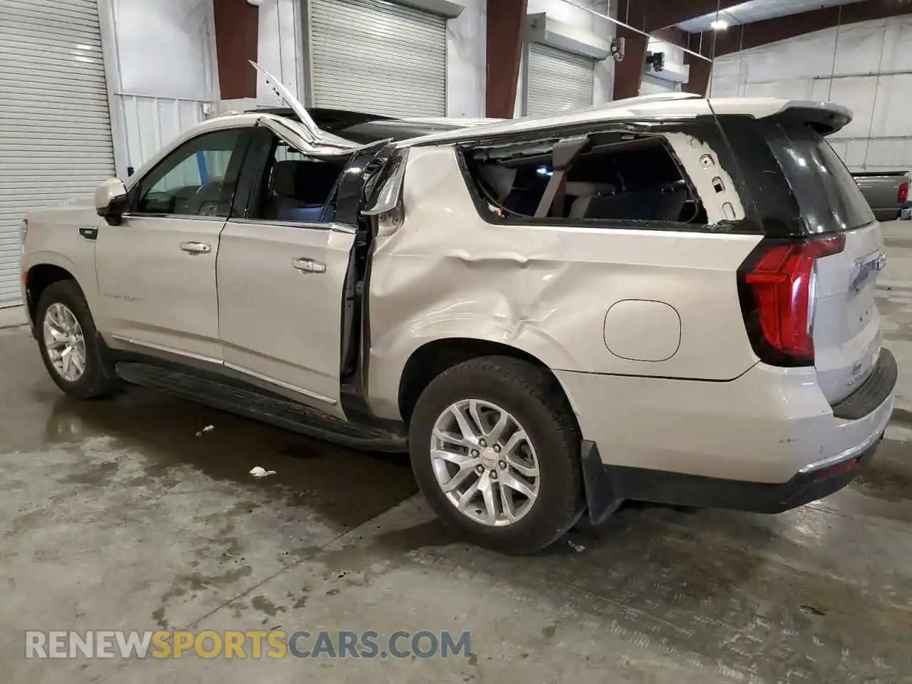 2 Photograph of a damaged car 1GKS2GKD1PR383677 GMC YUKON 2023