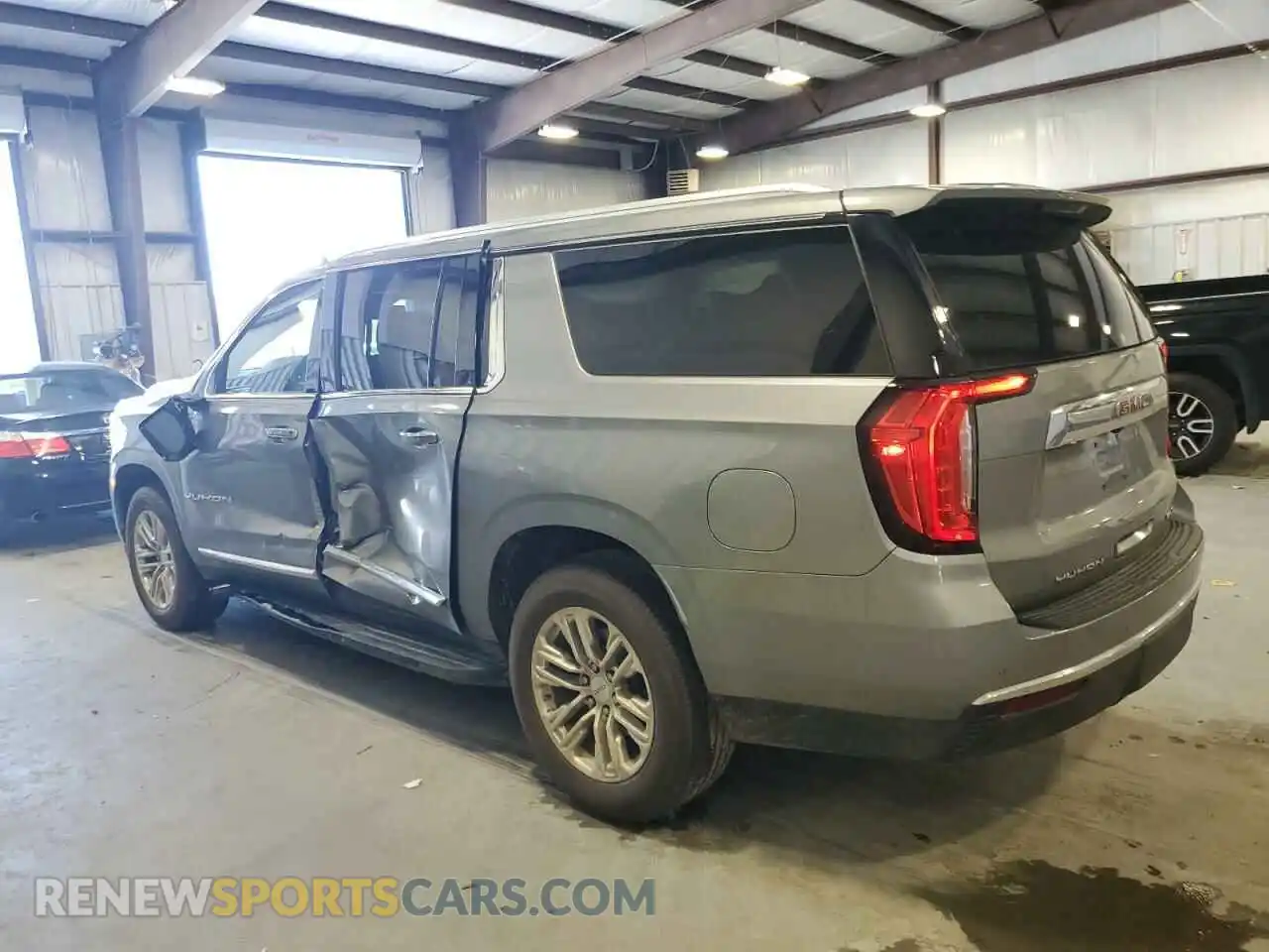 2 Photograph of a damaged car 1GKS2GKD3PR301643 GMC YUKON 2023