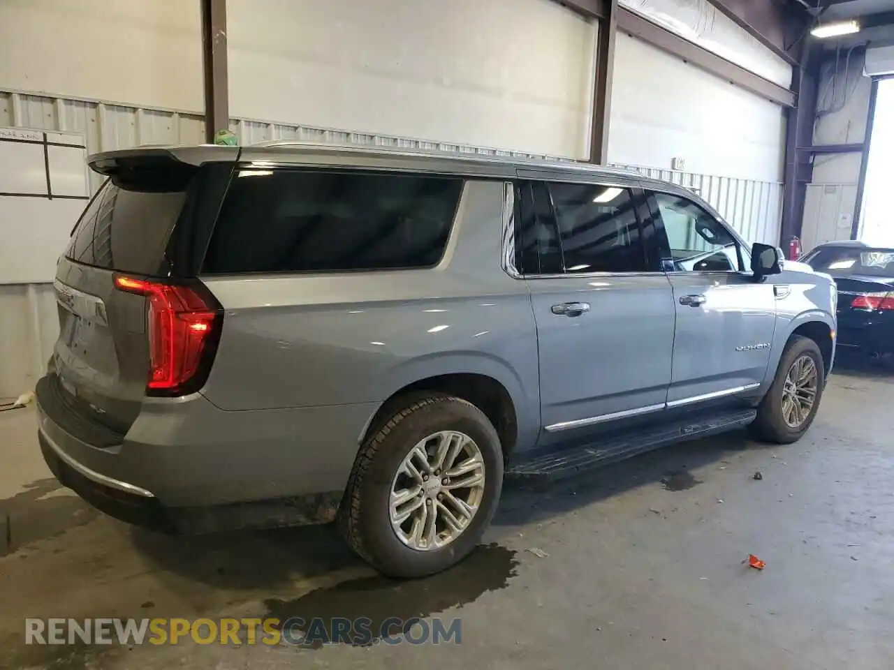 3 Photograph of a damaged car 1GKS2GKD3PR301643 GMC YUKON 2023