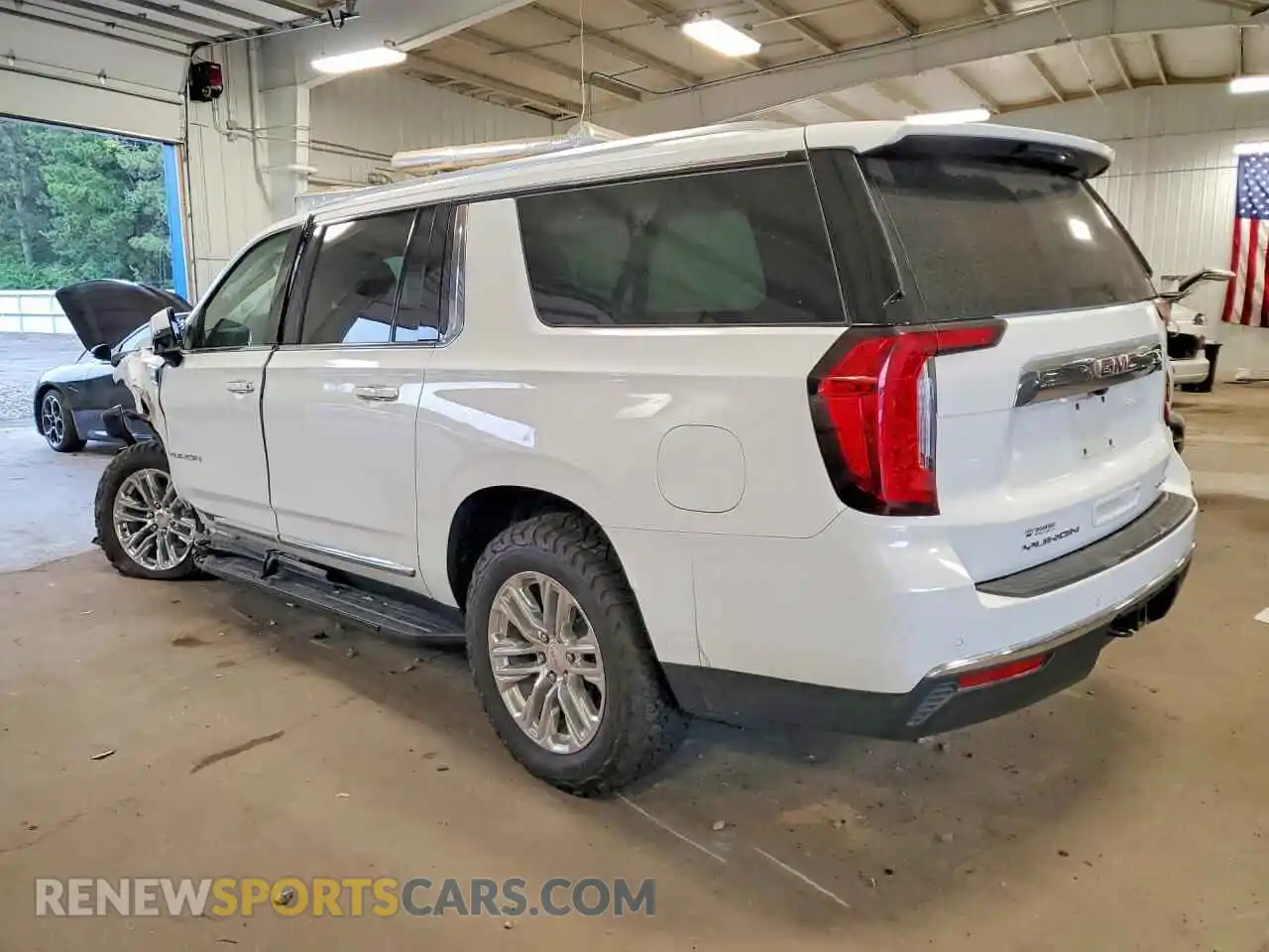 2 Photograph of a damaged car 1GKS2GKT3PR270806 GMC YUKON 2023