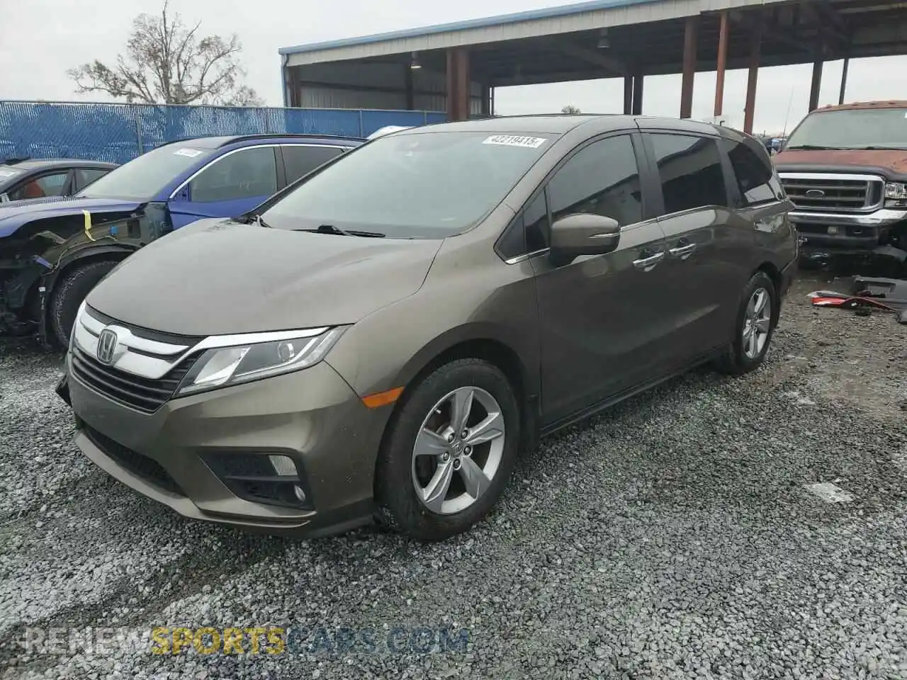 1 Photograph of a damaged car 5FNRL6H74KB099395 HONDA All Models 2019