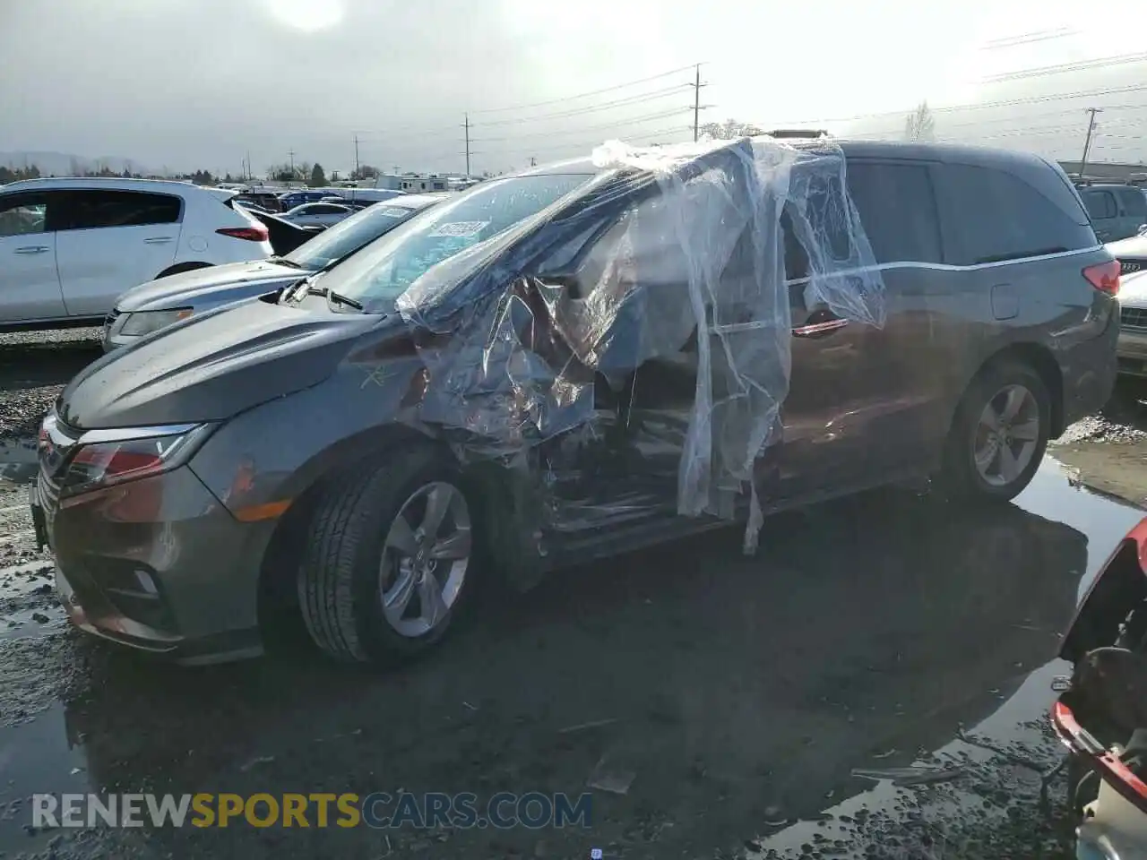1 Photograph of a damaged car 5FNRL6H57LB014386 HONDA All Models 2020