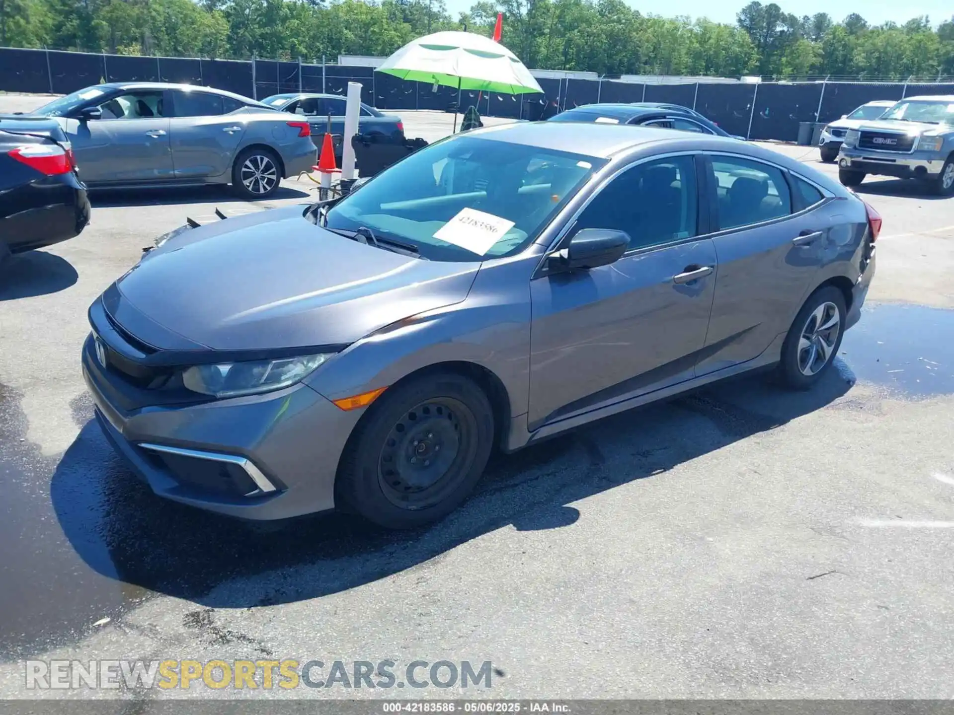 2 fotografías del automóvil dañado 19XFC2F62KE010340 HONDA CIVIC 2019