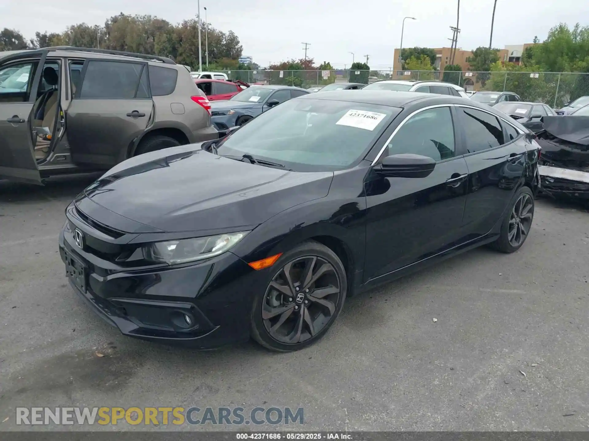 2 fotografías del automóvil dañado 2HGFC2F86KH551835 HONDA CIVIC 2019