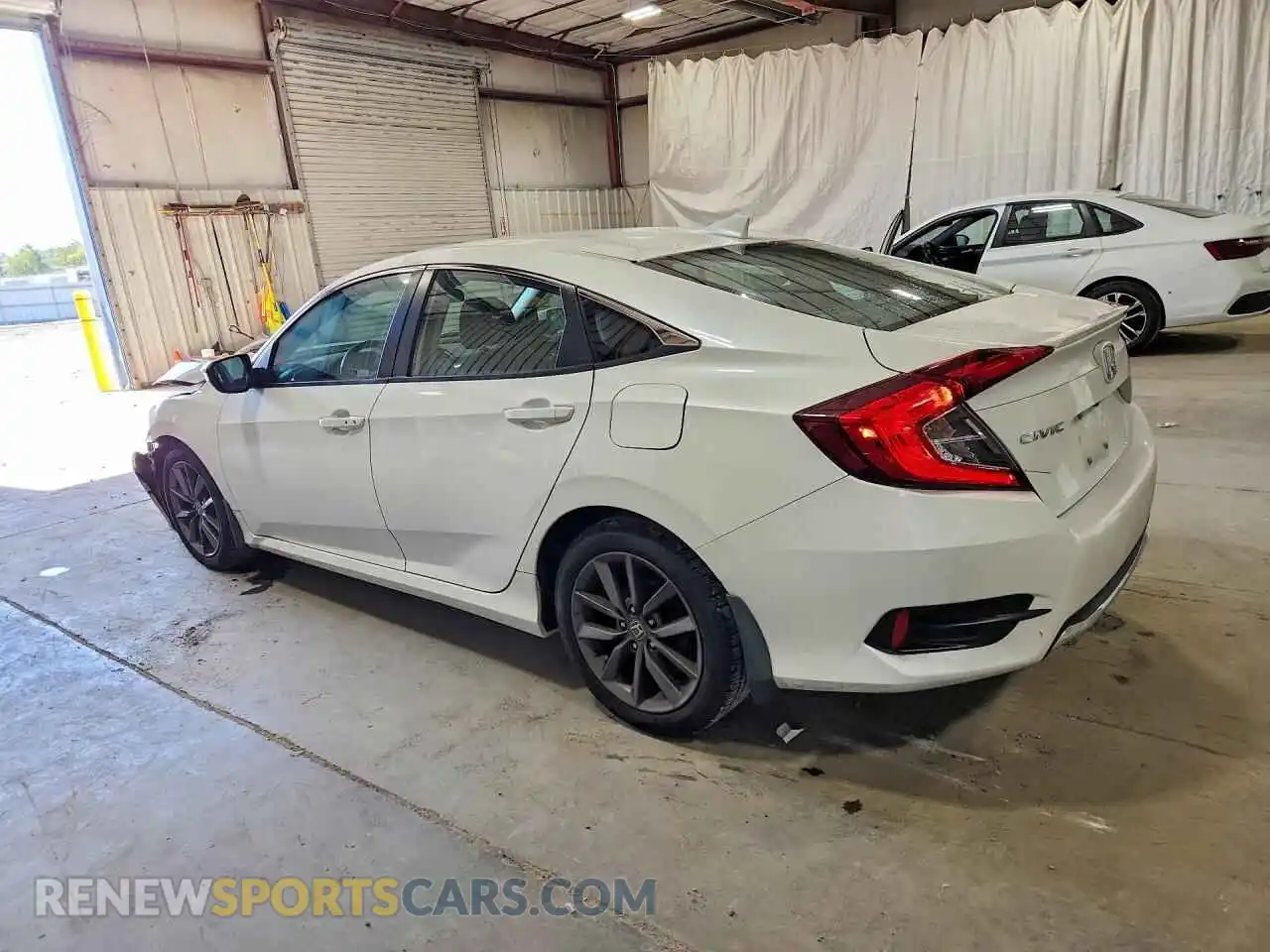 2 fotografías del automóvil dañado 19XFC1F39ME202731 HONDA CIVIC 2021