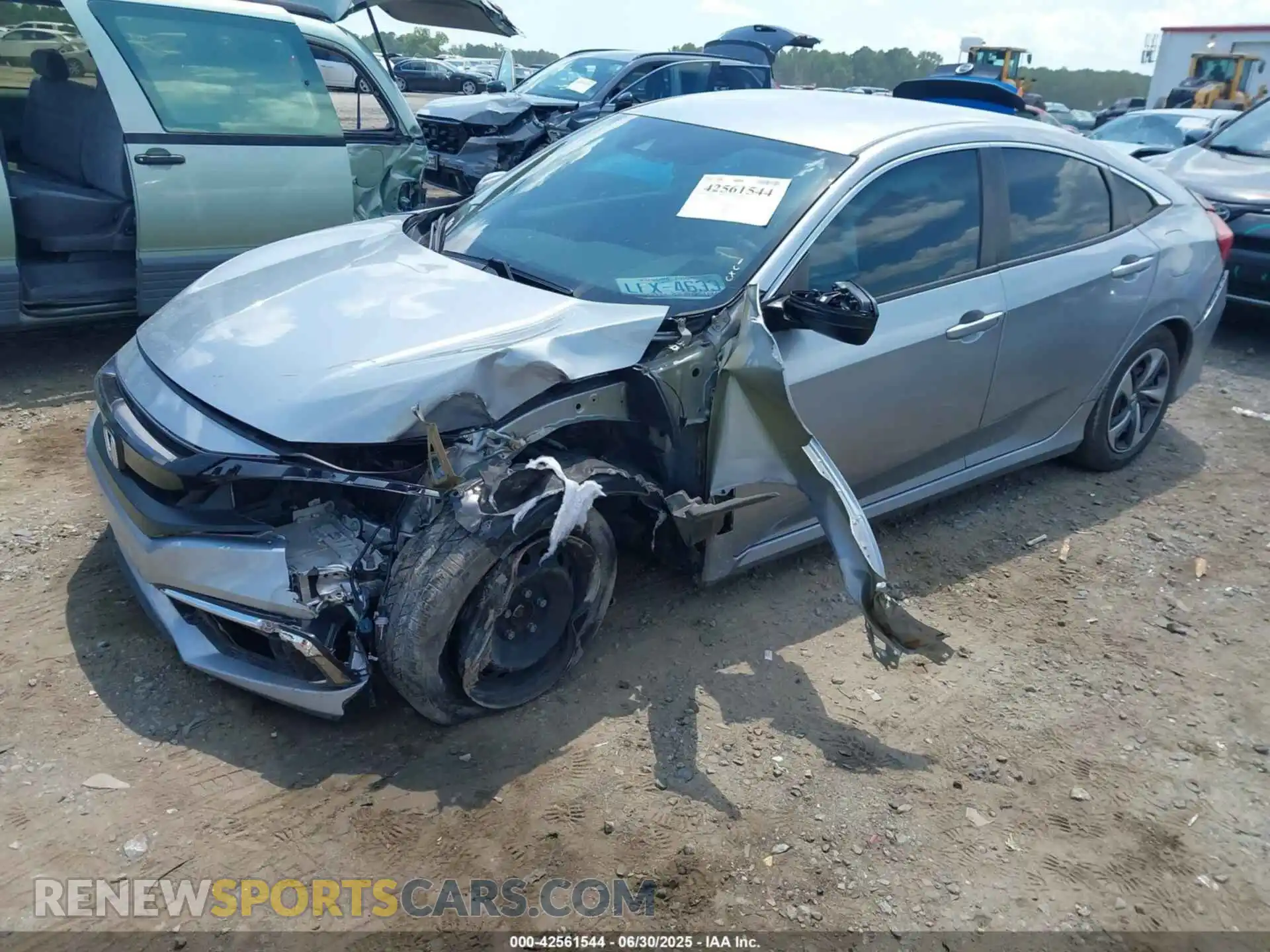 2 fotografías del automóvil dañado 2HGFC2F65MH529715 HONDA CIVIC 2021