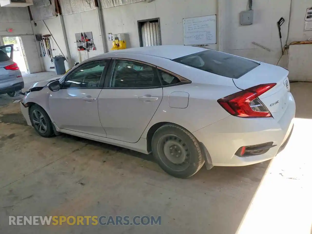 2 fotografías del automóvil dañado 2HGFC2F66MH509280 HONDA CIVIC 2021