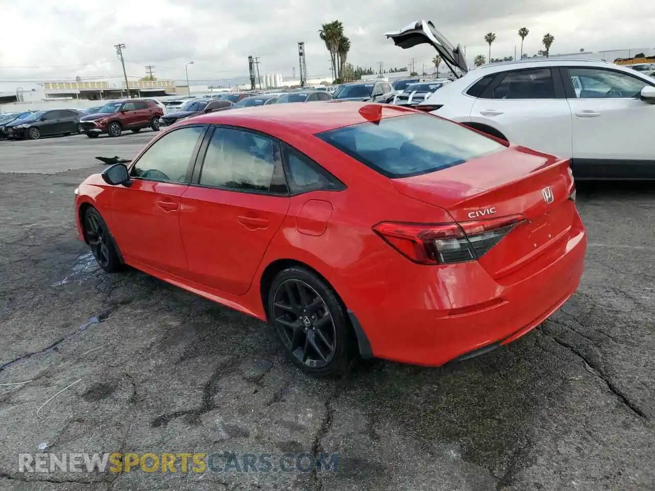 2 fotografías del automóvil dañado 2HGFE2F55NH555329 HONDA CIVIC 2022